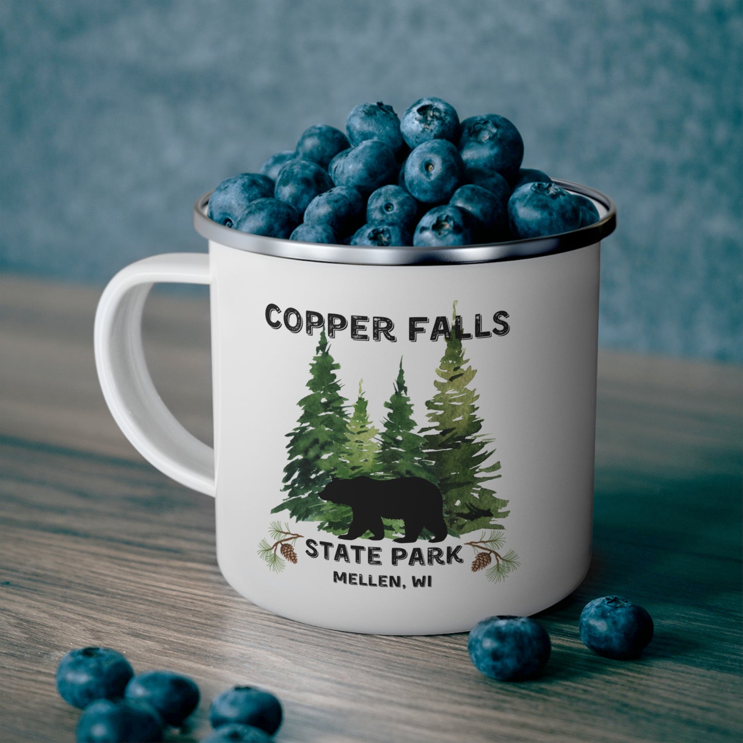 White enamel mug with a forest scene and black bear and the text Copper Falls State Park, Mellen, WI