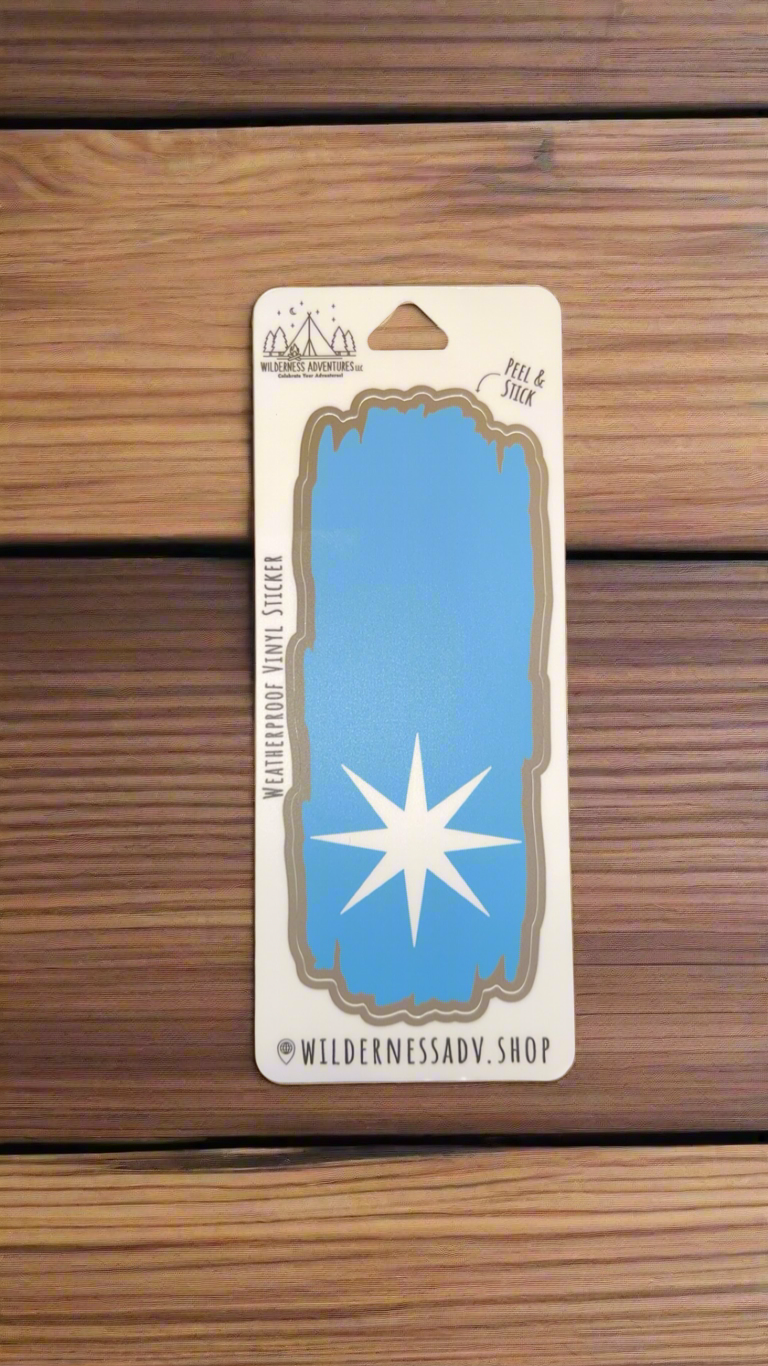 Blue colored National Trail Blaze decal with a white Polaris star icon on the bottom half of the decal. 