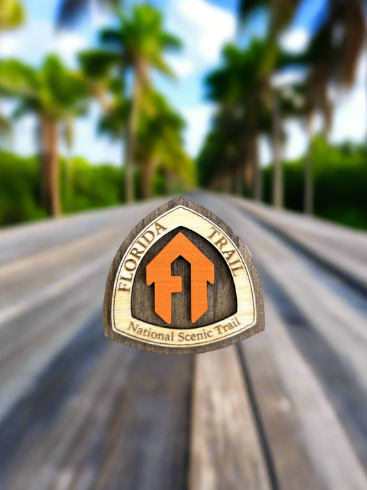 National Trail Symbol with the text "Florida Trail National Scenic Trail" and an orange "FT" symbol. 