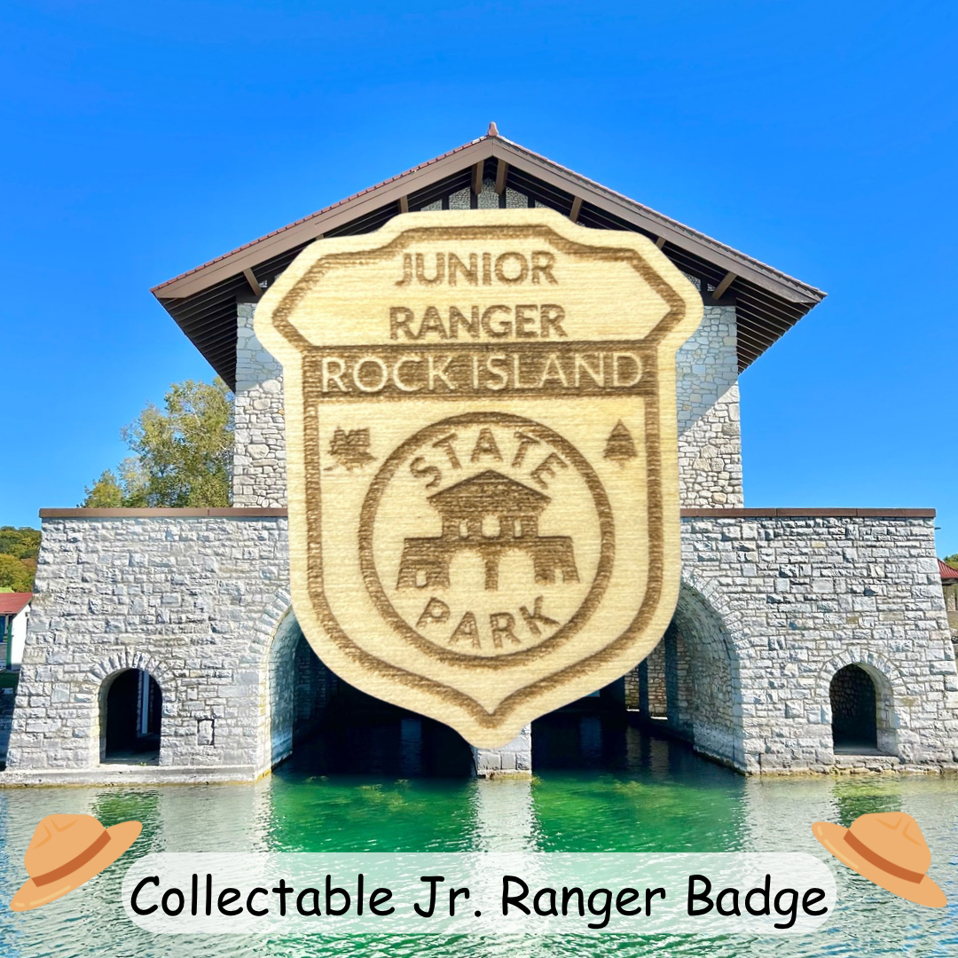 Wood Jr Ranger badge with the text: Junior Ranger, Rock Island State Park.  Photo background: stone boat house at Rock Island State Park.